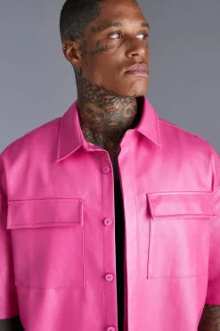 Shop boohooMAN PU Oversized Shirt pink