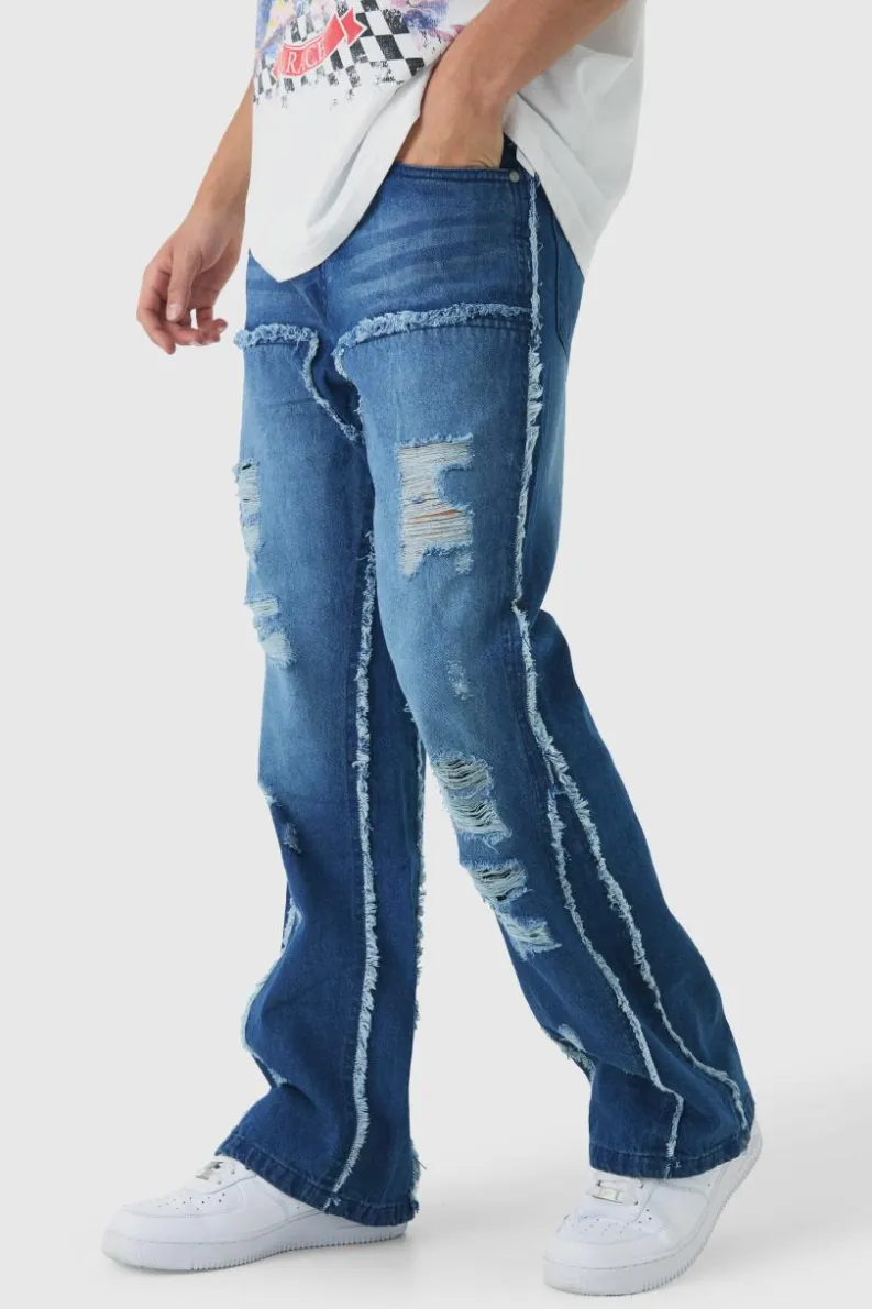 Clearance boohooMAN Raw Edge Rip & Repair Carpenter Panel Relaxed Fit Flared Jeans mid blue