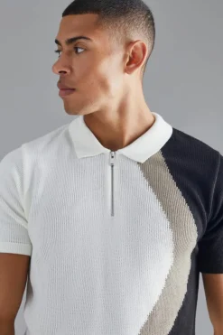Shop boohooMAN Regular Curved Jacquard Half Zip Knitted Polo ecru