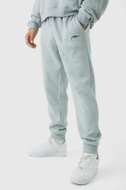 Shop boohooMAN Regular Fit Basic Man Signature Jogger grey marl
