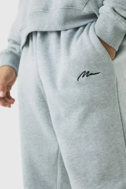 Shop boohooMAN Regular Fit Basic Man Signature Jogger grey marl