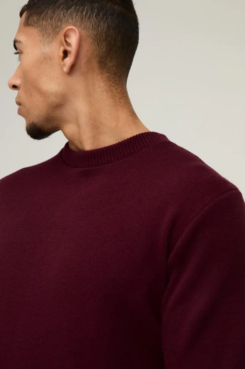 Shop boohooMAN Regular Fit Crew Neck Knitted Jumper burgundy