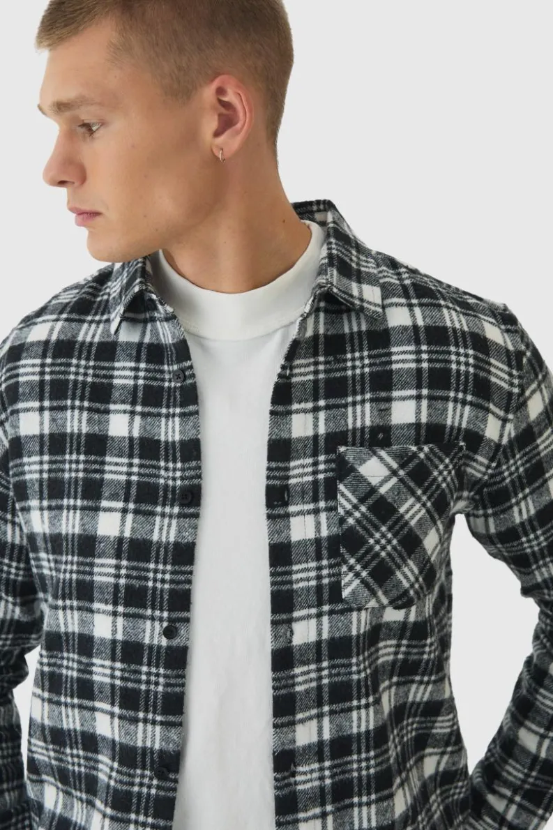 Shop boohooMAN Regular Fit Flannel Check Long Sleeve Shirt black