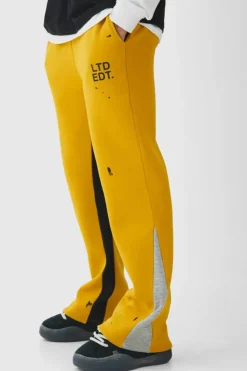 Online boohooMAN Regular Fit Ltd Edt Man Paint Splatter Gusset Jogger yellow