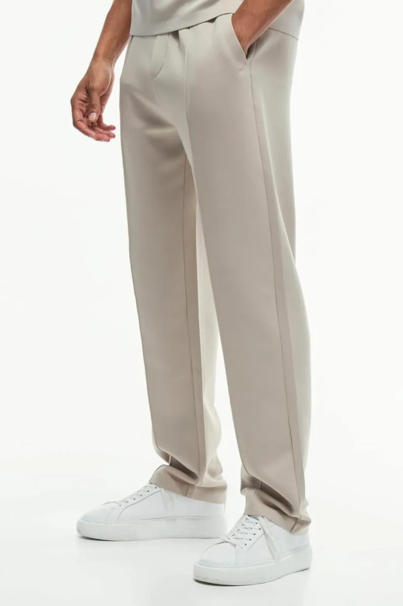 Shop boohooMAN Regular Fit Premium Scuba Pintuck Jogger sand