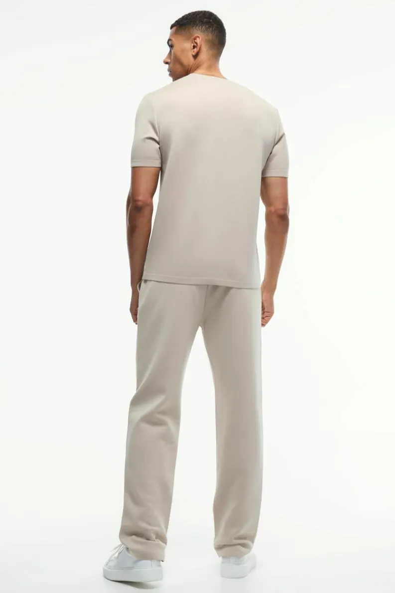 Shop boohooMAN Regular Fit Premium Scuba Pintuck Jogger sand