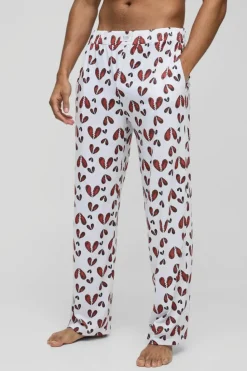 Hot boohooMAN Relaxed Broken Hearts Lounge Bottoms white