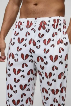 Hot boohooMAN Relaxed Broken Hearts Lounge Bottoms white