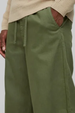 Store boohooMAN Relaxed Chinos With Drawcords In khaki