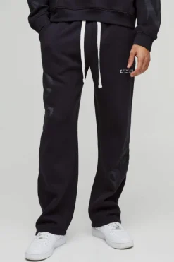 Store boohooMAN Relaxed Fit All Over Heart Printed Jogger black