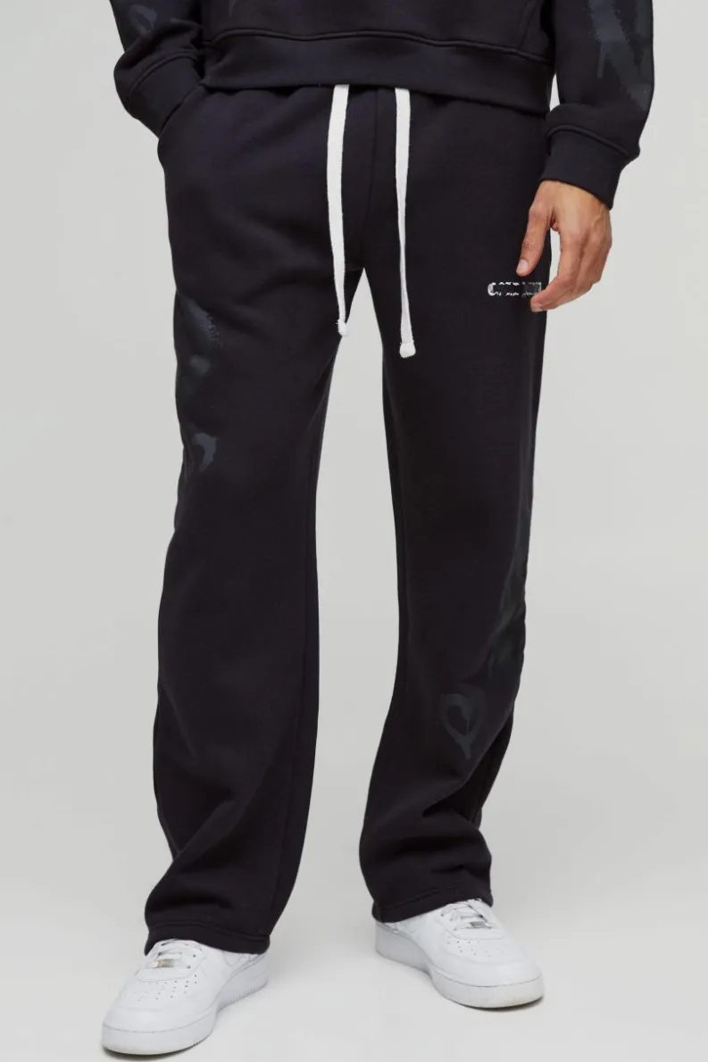 Store boohooMAN Relaxed Fit All Over Heart Printed Jogger black