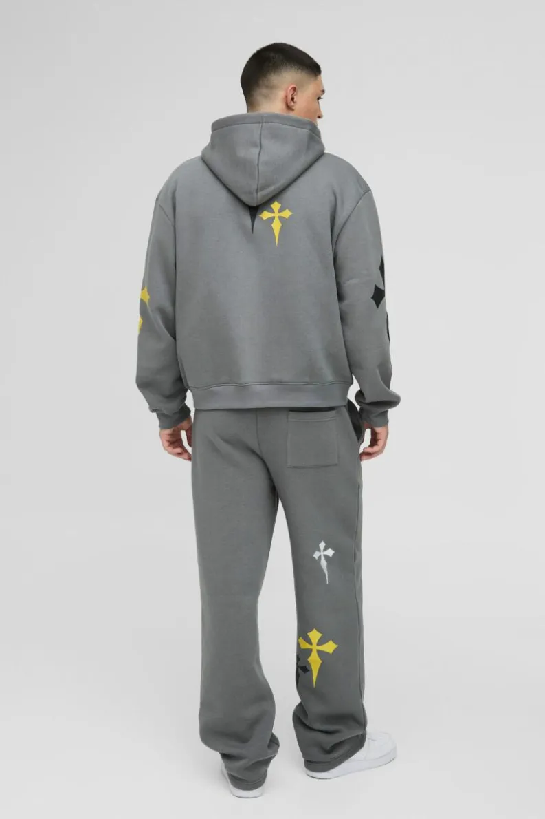 Shop boohooMAN Relaxed Fit Cross Embroidered Printed Jogger charcoal