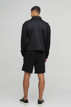 Shop boohooMAN Relaxed Fit Elasticated Waist Scuba Short black