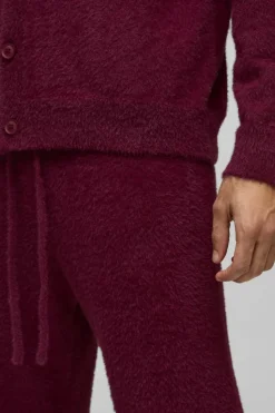 Store boohooMAN Relaxed Fit Fluffy Knitted Joggers burgundy