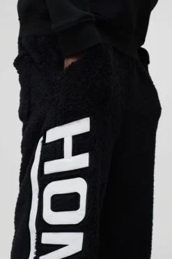 Discount boohooMAN Relaxed Fit Homme Embroidered Teddy Borg Joggers black