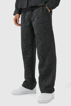 Shop boohooMAN Relaxed Fit Jacquard Abstract Pattern Trouser black