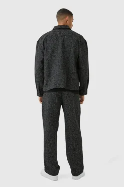 Shop boohooMAN Relaxed Fit Jacquard Abstract Pattern Trouser black