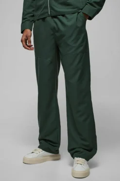 Online boohooMAN Relaxed Fit Panel Detail Elasticated Waist Nylon Trouser forest