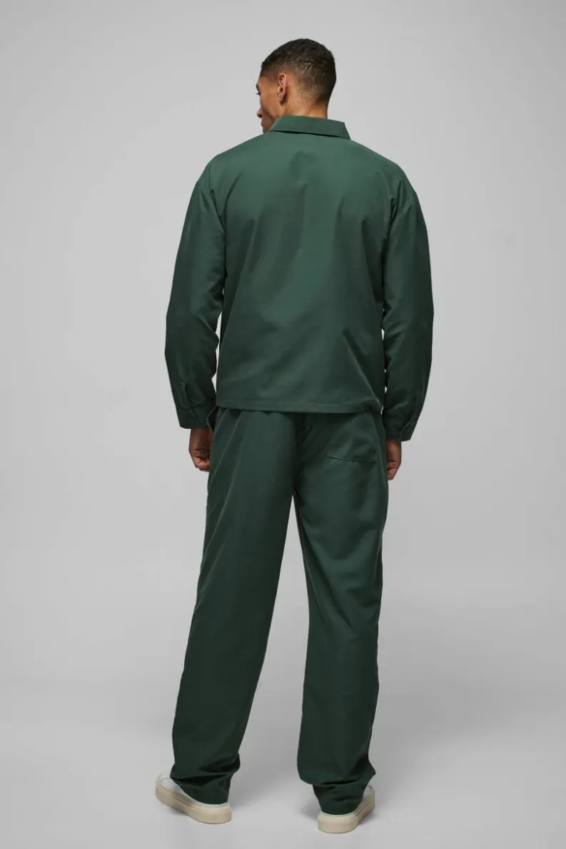 Online boohooMAN Relaxed Fit Panel Detail Elasticated Waist Nylon Trouser forest
