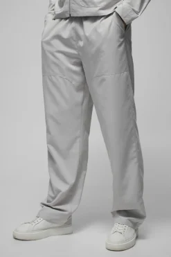 Outlet boohooMAN Relaxed Fit Panel Detail Elasticated Waist Nylon Trouser light grey