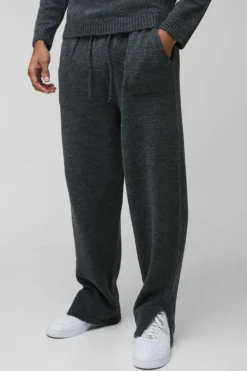 Shop boohooMAN Relaxed Fit Split Hem Brushed Knit Joggers charcoal