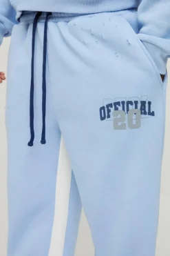 Fashion boohooMAN Relaxed Flare Official Varsity Distressed Gusset Jogger blue