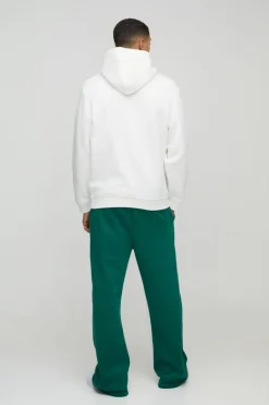 Outlet boohooMAN Relaxed Flare Official Varsity Distressed Gusset Jogger forest