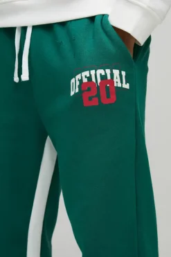 Outlet boohooMAN Relaxed Flare Official Varsity Distressed Gusset Jogger forest