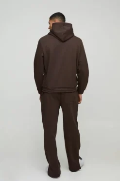 Store boohooMAN Relaxed Heavyweight Embossed Pocket Detail Split Hem Joggers chocolate