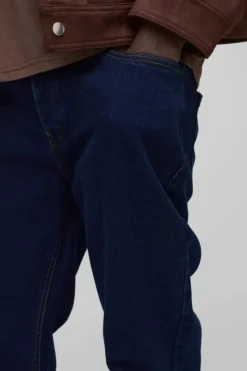 Hot boohooMAN Relaxed Rigid Flare Jean In indigo