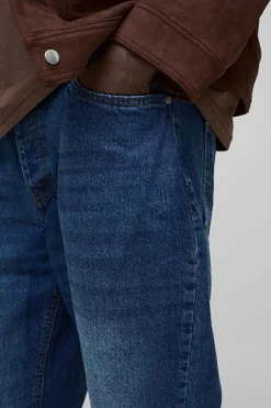 New boohooMAN Relaxed Rigid Flare Jean In mid blue