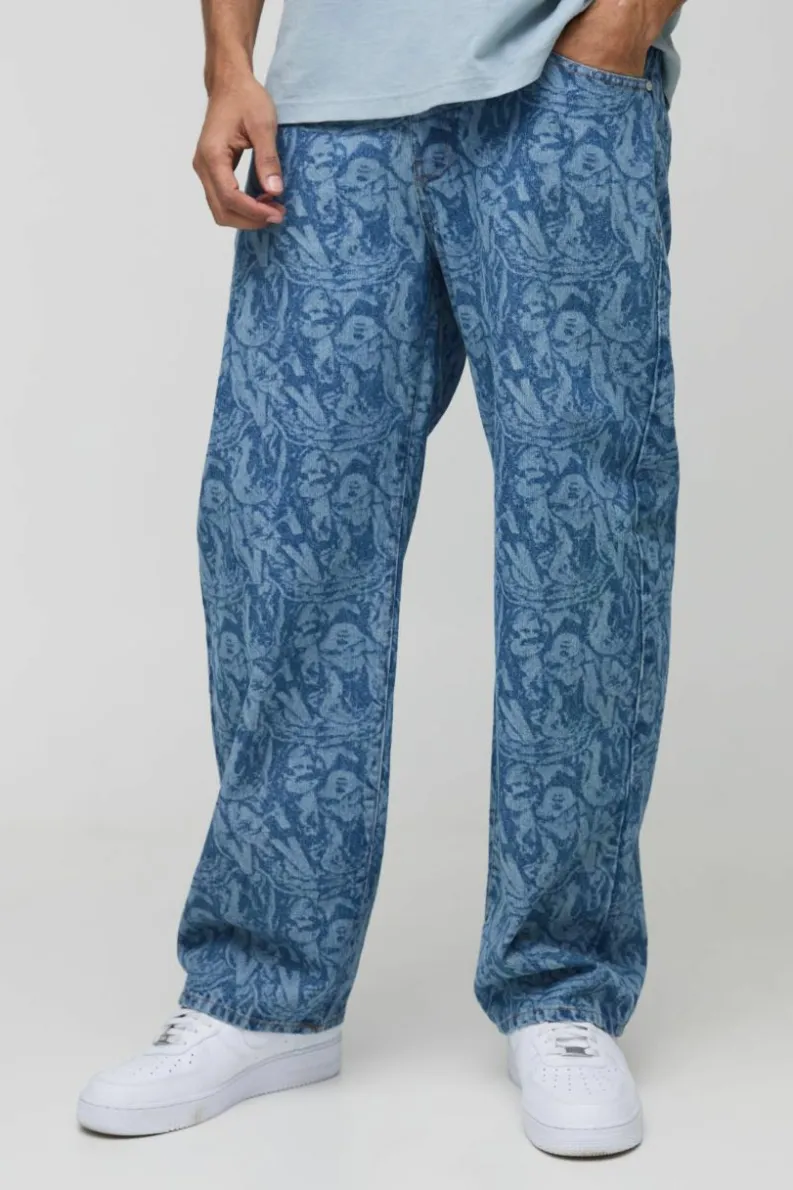 Shop boohooMAN Relaxed Rigid Laser Printed Denim Jeans mid blue