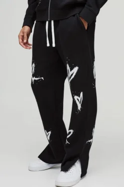 Hot boohooMAN Relaxed Split Hem Heart Jogger black