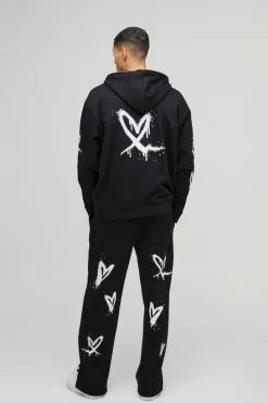 Hot boohooMAN Relaxed Split Hem Heart Jogger black