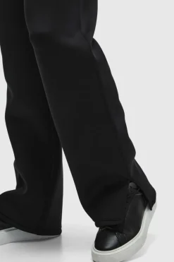 Shop boohooMAN Relaxed Split Hem Scuba Jogger true black