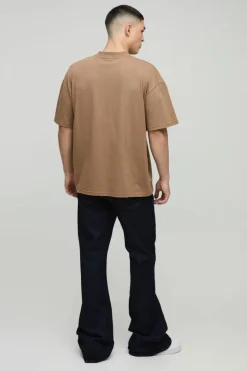 Sale boohooMAN Relaxed Stacked Flared Rigid Raw Jeans indigo