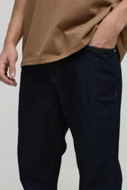 Sale boohooMAN Relaxed Stacked Flared Rigid Raw Jeans indigo