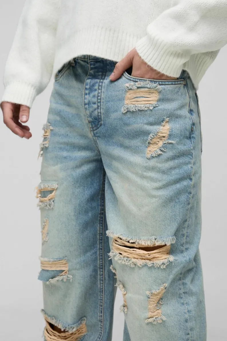 Best boohooMAN Relaxed Stacked Rigid Extreme Ripped Washed Denim Jeans stonewash