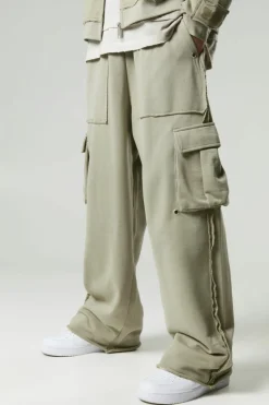 Shop boohooMAN Relaxed Wide Leg Eyelet Detail Loopback Cargo Jogger taupe