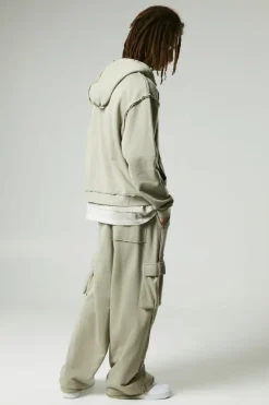 Shop boohooMAN Relaxed Wide Leg Eyelet Detail Loopback Cargo Jogger taupe