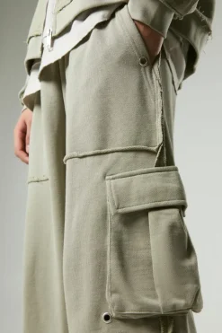Shop boohooMAN Relaxed Wide Leg Eyelet Detail Loopback Cargo Jogger taupe