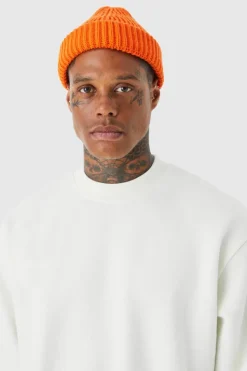 Shop boohooMAN Ribbed Micro Beanie orange