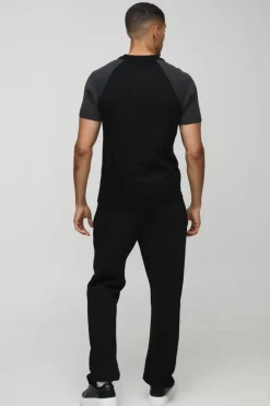 Discount boohooMAN Short Sleeve Muscle Fit Raglan Colour Block Knit Polo black