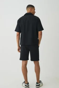 Shop boohooMAN Short Sleeve Revere Oversized Pleated Shirt black