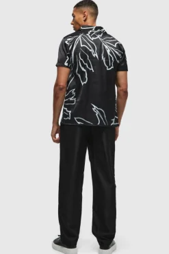 Shop boohooMAN Short Sleeve Satin Tonal Palm Shirt black