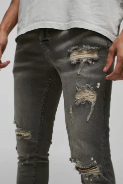 Best boohooMAN Skinny Stretch Bleached Ripped Knee Jeans grey