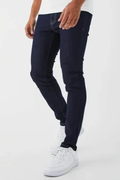 Shop boohooMAN Skinny Stretch Jean indigo