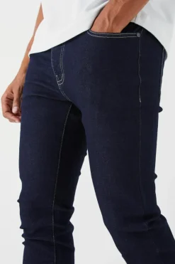 Shop boohooMAN Skinny Stretch Jean indigo