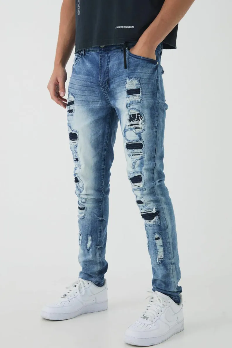Online boohooMAN Skinny Stretch Ripped Jeans blue