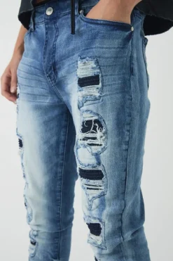 Online boohooMAN Skinny Stretch Ripped Jeans blue